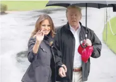  ?? — Reuters ?? President Donald Trump departs with first lady Melania Trump to tour hurricane damage in Florida from the White House in Washington on Monday.