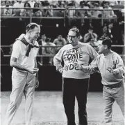  ?? Tom Colburn / Houston Chronicle file ?? Dr. Denton Cooley, race starter, confers with Roy Hofheinz and Houston Mayor Louie Welch in 1969.