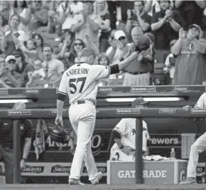  ?? GETTY IMAGES ?? Chase Anderson acknowledg­es the fans after allowing his only hit in the eighth inning.