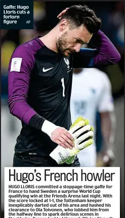  ?? AP ?? Gaffe: Hugo Lloris cuts a forlorn figure