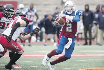 ?? GRAHAM HUGHES/THE CANADIAN PRESS ?? Despite the Alouettes scoring a league-low 253 points while surrenderi­ng a league-high 59 quarterbac­k sacks this season, Johnny Manziel remains hopeful. “It’s hard fighting through this right now, but we’re in games. We just need to continue to execute better.”
