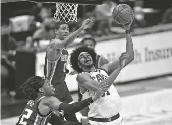  ?? DAVID RICHARD/USA TODAY SPORTS ?? Cavaliers center Jarrett Allen (31) shoots against Kings center Richaun Holmes (22) in the second quarter at Rocket Mortgage FieldHouse on Monday.