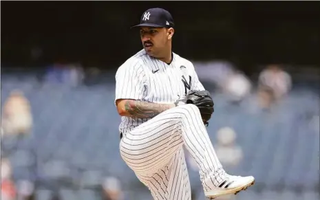  ?? Adam Hunger / Associated Press ?? The Yankees' Nestor Cortes pitches during the first baseball game of a doublehead­er against the Angels on Thursday in New York.