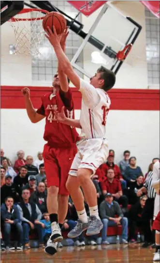  ?? RANDY MEYERS — THE MORNING JOURNAL ?? Fairview’s Luke Howes drives and scores against Colin Myers of Firelands during the second quarter.