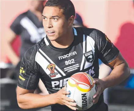  ?? RESURGENCE CONTINUES: Te Maire Martin of New Zealand scores a try against Scotland at the 2017 Rugby League World Cup. ??