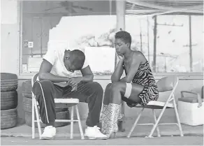  ??  ?? Slim ( Daniel Kaluuya), left, and Queen ( Jodie Turner- Smith) get to know each other on the lam in “Queen & Slim.”