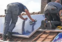  ?? PIXABAY ?? Installing solar panels on home roofs is one of the ways that the Dutch government hopes to cut carbon emissions.