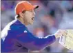  ?? Streeter Lecka Getty Images ?? CLEMSON’S Dabo Swinney joined his players in a protest.