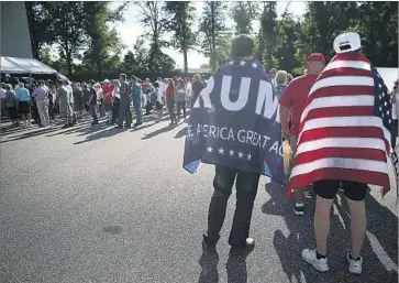  ?? Mark Wilson Getty Images ?? SUPPORTERS of Donald Trump at a campaign rally in Aston, Pa. Trump is counting on his support for hydraulic fracturing to help him in key states with large shale reserves and a lot of blue-collar voters.