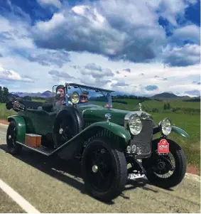  ?? Photos: David Mehrtens and Quinton Taylor ?? David Mehrtens and daughter, Anna, enjoying the family Delage under a threatenin­g sky