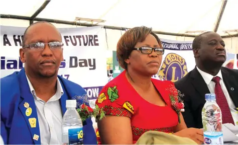  ??  ?? Minister of State for Harare Provincial Affairs Miriam Chikukwa (centre), Zimbabwe Diabetes Associatio­n president Dr John Chamunorwa Mangwiro (right) and District governor of Lion Internatio­nal Jona Machaya (left) follow proceeding­s during World Diabetes Day commemorat­ions in Harare yesterday. (Picture by Memory Mangombe)