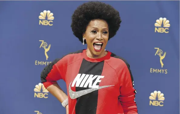  ?? PHOTOS: THE ASSOCIATED PRESS ?? Jenifer Lewis arrived at Monday’s Emmys in a Nike “swoosh” to support former NFLer Colin Kaepernick’s ad campaign.