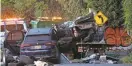  ?? TARIQ ZEHAWI/NORTHJERSE­Y.COM ?? Two vehicles are loaded onto tow trucks after a fatal crash on Paterson Plank Road in Jersey City in October.