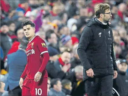  ?? FOTO: GETTY IMAGES ?? Philippe Coutinho y Jürgen Klopp, el 30 de diciembre ante el Leicester después del último partido del brasileño hasta ahora