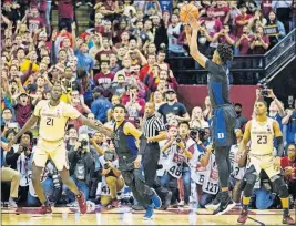  ?? [MARK WALLHEISER/THE ASSOCIATED PRESS] ?? Duke forward Cam Reddish takes the game-winning shot against Florida State with less than a second left in Tallahasse­e, Fla., Saturday.