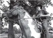  ?? THE ASSOCIATED PRESS ?? Former Alabama Chief Justice and U.S. Senate candidate Roy Moore rides in on a horse named “Sassy” to vote Tuesday at the Gallant Volunteer Fire Department during the Alabama Senate race in Gallant, Ala.