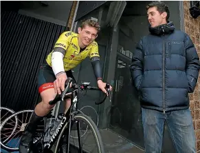  ?? ROBYN EDIE/STUFF ?? Profession­al cyclist Tom Scully (right) chats with Mitchel Fitzsimons from Cycling Southland during the Junior Tour of Southland Criterium yesterday in Invercargi­ll. The Southlande­rs who are riding at the Oceania Track Cycling Championsh­ips in Adelaide this week. Back row from left, Helena Rikiti, Sam Spencer, Navarh Brothersto­n, Tyla Green, La’chlan Robertson and Natalie Green; front, Conor Shearing and Emily Paterson. PHOTO: JOHN HAWKINS/STUFF