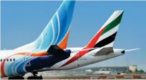  ??  ?? Both Dubai-based airlines offer customers a breadth of travel options across their complement­ary networks.