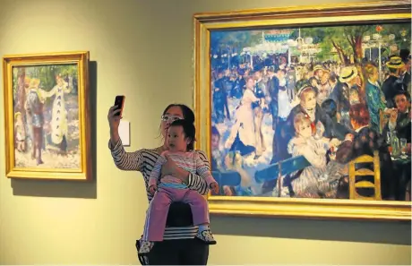  ?? Picture: AFP ?? IRRITATING: Those of us who want to admire art — like Renoir’s ‘Dance at le Moulin de la Galette’ — in an atmosphere of decorum would like a ban on people taking selfies in museums and galleries
