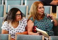  ??  ?? Laura Mireles Anzures speaks out on her experience­s while attending a Stronger Together meeting with her daughter Alicia, a student at Campbell Middle School. In its meetings, Stronger Together collects individual accounts of perceived racism.