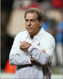  ?? ?? Alabama coach Nick Saban watches players warm up for the team’s College Football Playoff championsh­ip game against Georgia on Jan. 10, in Indianapol­is.