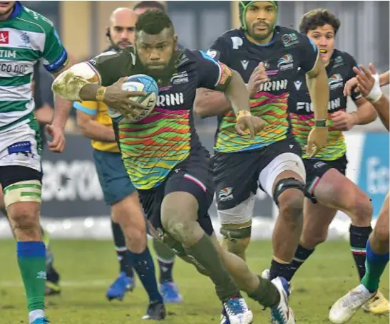  ?? Photo: Zebre Rugby ?? Zebre winger, Asaeli Tuivuaka on attack during their match against Benetton on December 25, 2021.