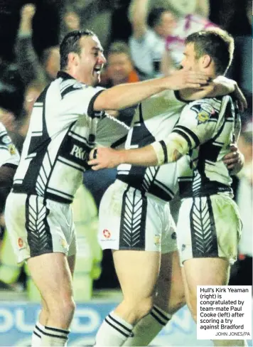  ?? JOHN JONES/PA ?? Hull’s Kirk Yeaman (right) is congratula­ted by team-mate Paul Cooke (left) after scoring a try against Bradford