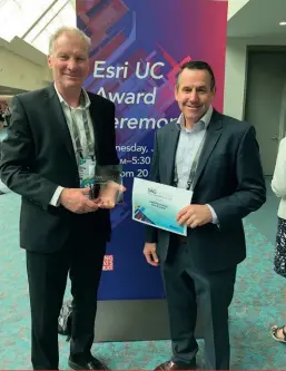  ??  ?? Dave Mole, left, and Jerome Sheppard with the Esri award.