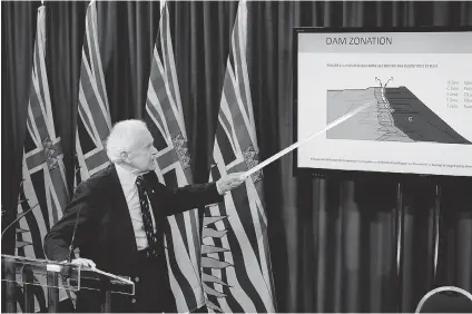  ??  ?? Norbert Morgenster­n, co-chairman of the independen­t panel, points to a diagram during the release on Friday of its report into last year’s tailings storage facility breach at the Mount Polley mine.