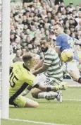  ?? ?? 0 Celtic’s Joe Hart makes a crucial save from Scott Arfield