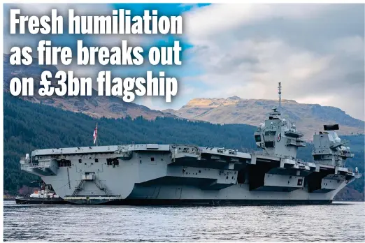  ?? ?? Blaze on board: The aircraft carrier HMS Queen Elizabeth arriving in Scotland for repairs before the latest setback