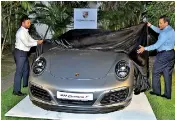  ??  ?? IWS Chairman Arthur Senanayake and Eurocars General Manger Ravi Opatha unveiling the Porsche 911 Carrera