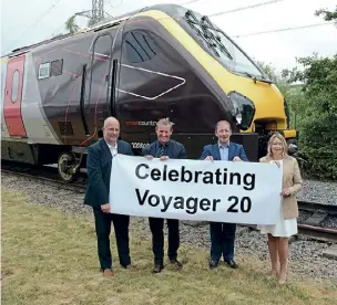  ?? ?? Gus Dunster (left, Avanti West Coast), Peter Broadley (Alstom), Rob Dee (Beacon Rail) and Gillian Ingham (CrossCount­ry) celebratin­g 20 years of ‘Voyagers’ and the naming of No. 220016.