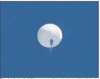  ?? (TNS/Zuma Press/Joe Granita) ?? The closely tracked Chinese surveillan­ce balloon drifts off the Atlanic coast Feb. 4, shortly before it was shot down over Surfside Beach, S.C.