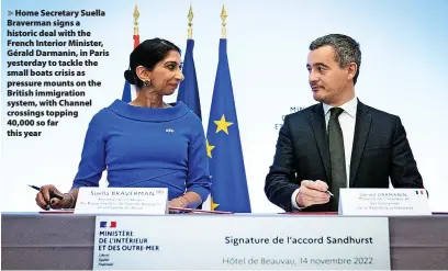  ?? Stefan Rousseau ?? Home Secretary Suella Braverman signs a historic deal with the French Interior Minister, Gérald Darmanin, in Paris yesterday to tackle the small boats crisis as pressure mounts on the British immigratio­n system, with Channel crossings topping
40,000 so far this year