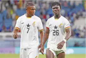  ?? ?? ABOVE: Abdul Fatawu Issahaku with his teammate Alidu Seidu after Ghana’s 2022 FIFA World Cup match against Uruguay in December 2022. BELOW: Abdul Fatawu Issahaku celebrates with Leicester City teammate Jamie Vardy in October 2023.