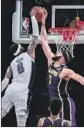  ?? Robert Gauthier L.A. Times ?? LAKERS CENTER JaVale McGee blocks a dunk attempt by Orlando guard Terrence Ross.