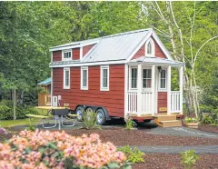  ?? MOUNT HOOD TINY HOUSE VILLAGE VIA THE NEW YORK TIMES ?? In an undated handout photo, the Scarlett, one of a few designs for short-stay rentals at a campground in Oregon.