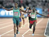  ?? /J U L I A N GETTY FINNEY/ IMAGES ?? Caster Semenya makes a run for it.