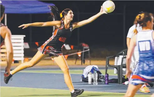  ?? Picture: BRENDAN RADKE ?? ALL CLASS: Saints' Akayla Peterson shows her athleticis­m in the victory over Centrals Trinity Beach on Friday.