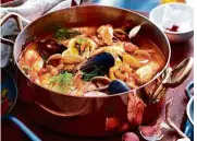  ??  ?? Taste the distinct Provencal dish of bouillabai­sse, a speciality of the region.