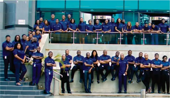  ??  ?? A wide shot of Access Bank’s management and staff gathered in front of the corporate headquarte­rs in Victoria Island, Lagos, to celebrate the 2019 Access Bank Sustainabi­lity Week