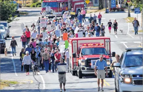  ?? KATHY JOHNSON ?? A rally and march was held in Shelburne on Sept. 22 to protest the health-care situation in this county and other parts of the province – particular­ly rural parts of the province.