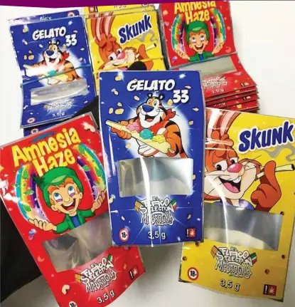  ?? ?? Cartoon allure: Children’s cereal characters used in colourful confection­ary-style packaging