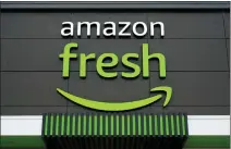  ?? MATT ROURKE— THE ASSOCIATED PRESS ?? An Amazon Fresh grocery store is seen Feb. 4, 2022, in Warrington, Pa. Amazon is looking to sell its cashier-less checkout system to third parties, while removing the technology from its Amazon Fresh stores.