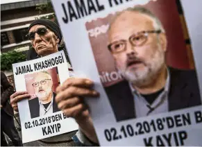  ?? — AFP ?? Demanding an answer: Protesters holding portraits of Khashoggi with the caption: ‘Jamal Khashoggi is missing since Oct 2’ during a demonstrat­ion in front of the Saudi Arabian consulate in Istanbul.