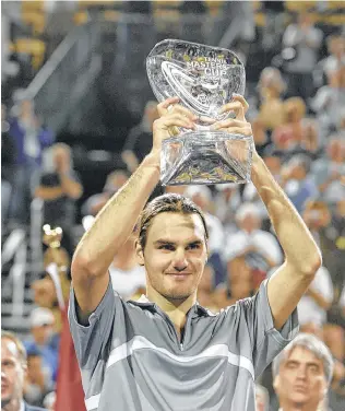  ?? Houston Chronicle file ?? Roger Federer’s victory over Andre Agassi in the 2003 Masters Cup final came at a time when tennis insiders were questionin­g his game.