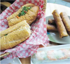  ?? MIKE BELL/PNG ?? Banh mi sandwiches and spring rolls from Vancouver’s Ong Ba Vietnamese Eatery, a popular MELA! Festivals vendor, are only one small but delicious part of the festival menu.