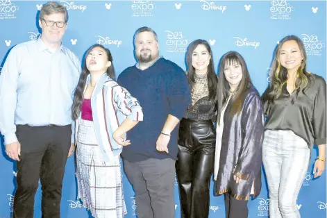  ?? photo — AFP file ?? (From left, right) Dean Wellins, Awkwafina, Paul Briggs, Cassie Steele, Osnat Shurer, and Adele Lim attend Go Behind The Scenes with Walt Disney Studios during D23 Expo 2019 at Anaheim Convention Centre on Aug 24, 2019 in Anaheim, California. Even as racist attacks on Asian-Americans have risen during the pandemic, Asian cinema is having a moment in Hollywood – something the stars of Disney’s ‘Raya and the Last Dragon’ say can’t come soon enough.