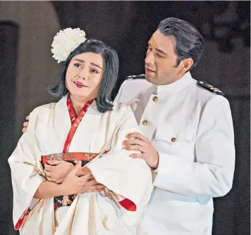  ??  ?? Doomed love: Olga Busuioc stars as Cio-cio-san and Joshua Guerrero as Pinkerton, in Glyndebour­ne Opera’s
Madama Butterfly, written by Puccini, left, in 1904